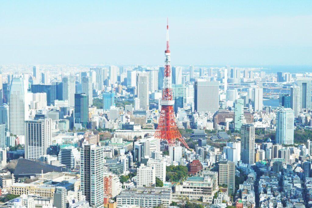 德川家康與東京 aerial photography of red tower surrounded by buildings during daytime