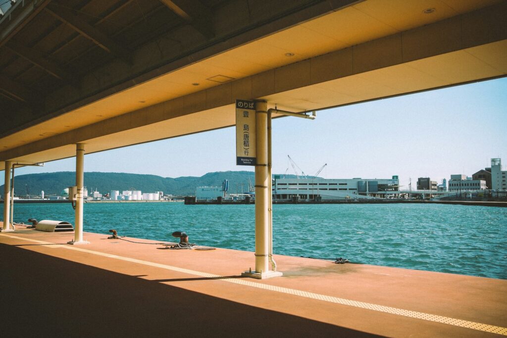 瀨戶內海藝術節2025 A view of a body of water from under a bridge