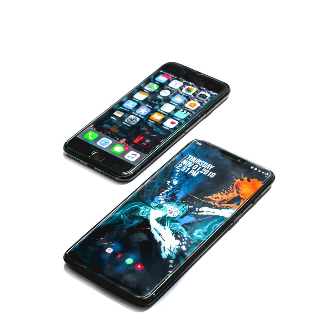 日本旅遊實用App two black smartphones